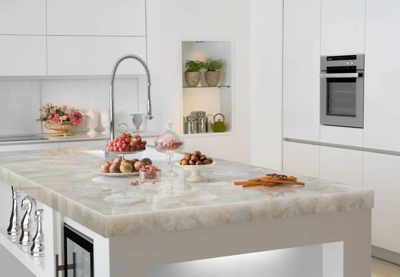 White kitchen with a marble tabletop