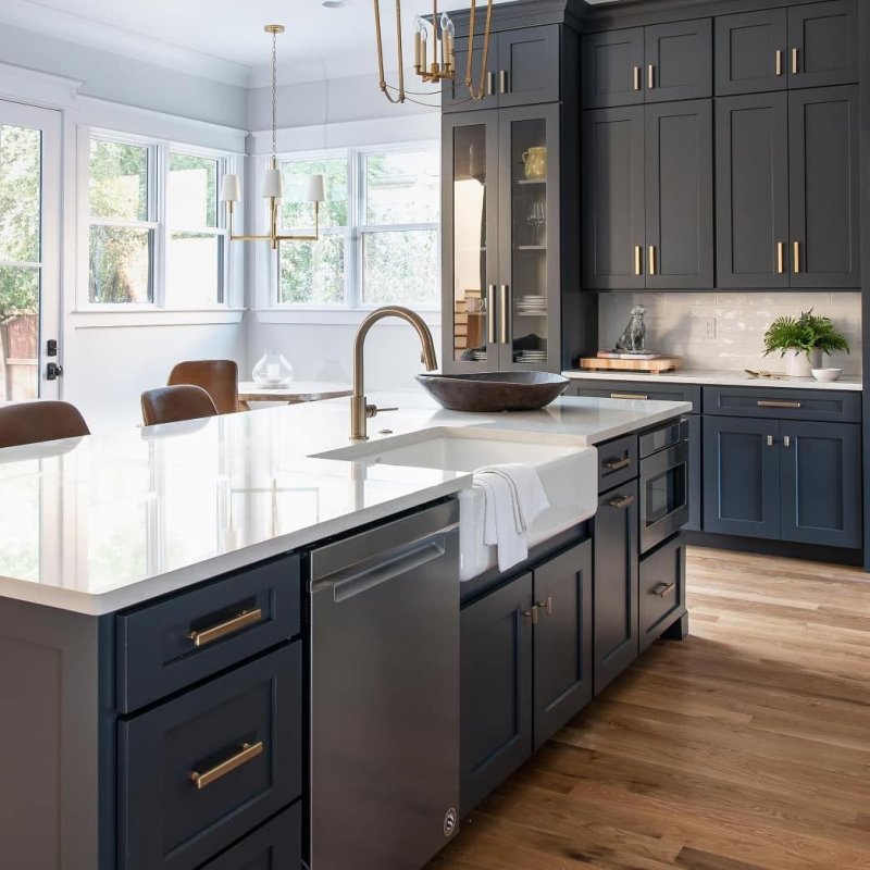 Dark blue kitchen in the interior