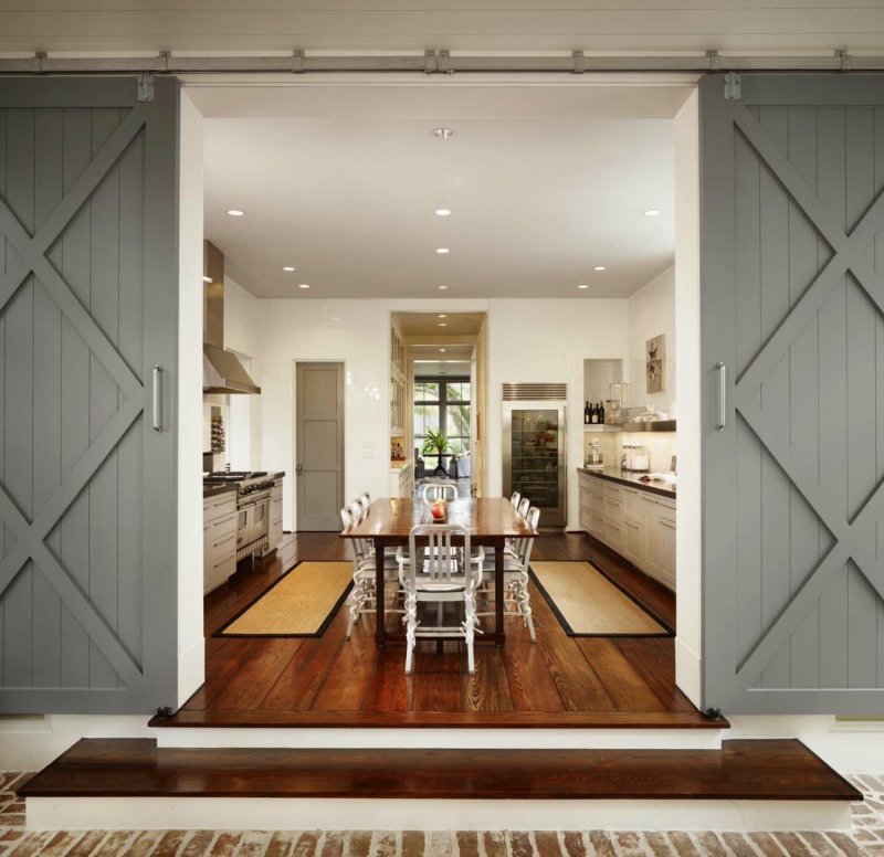 Sliding doors between the kitchen and the living room