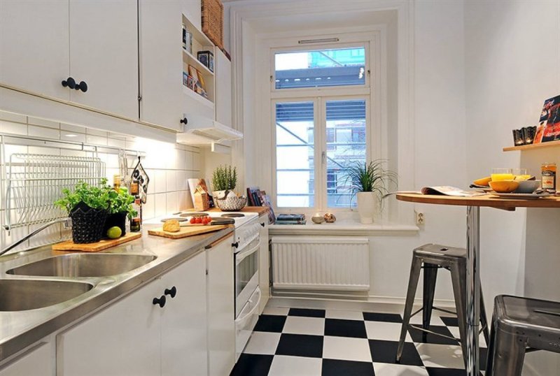 The interior of a narrow kitchen