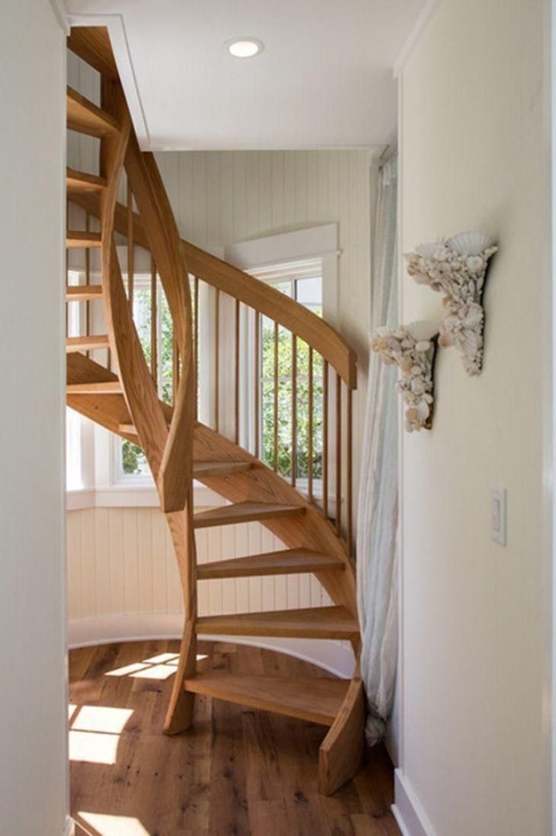 The spiral staircase is wooden