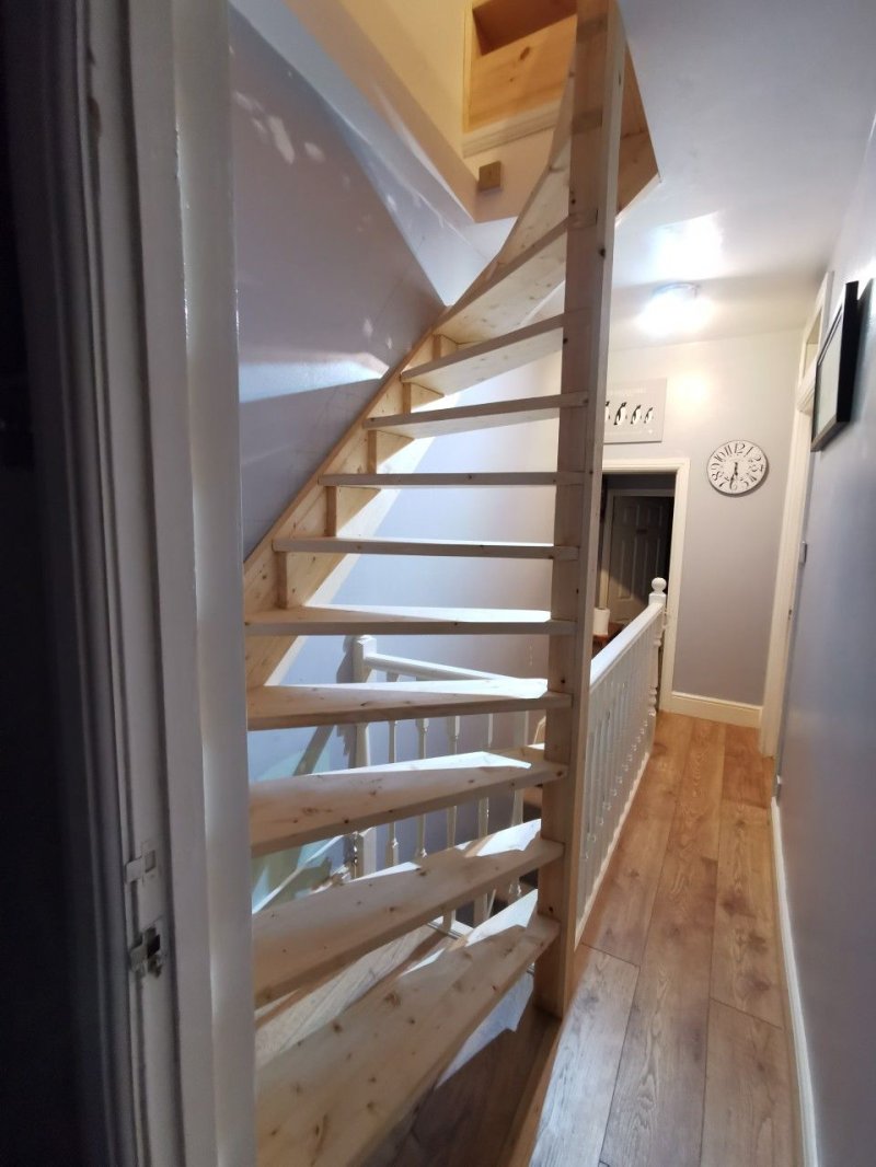 Wooden staircase to the second floor