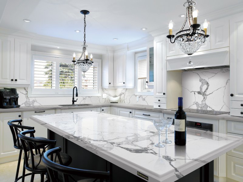 White kitchen with a marble tabletop