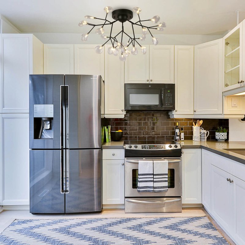 Kitchen with a refrigerator Side Bai Side