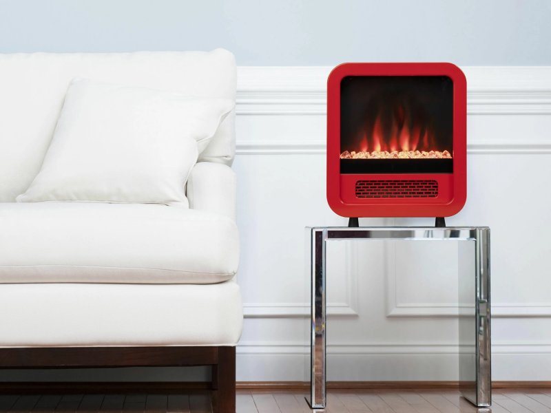 Heater in the form of an electric fireplace