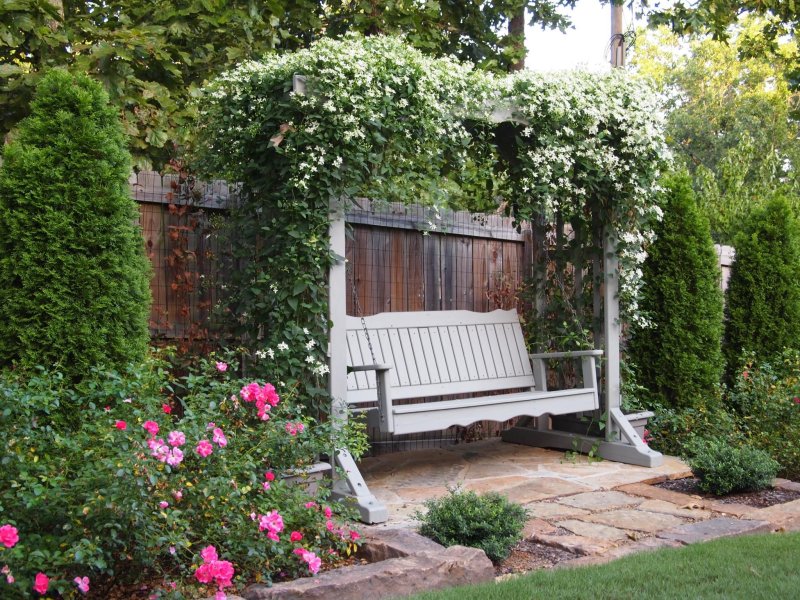 Pergola with a bench shady garden