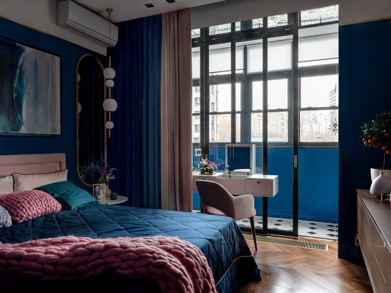 Blue curtains in the interior of the bedroom