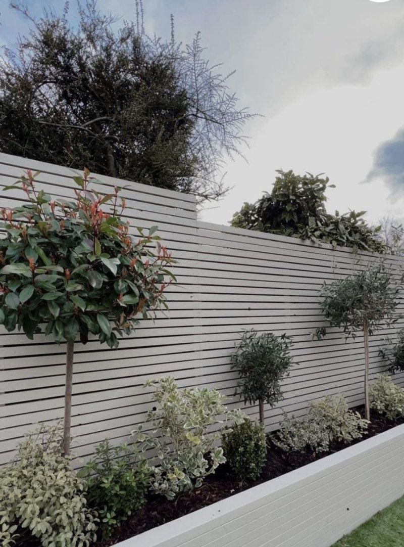 Landscaping along the fence