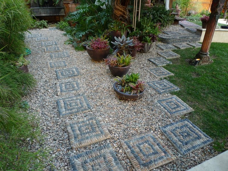 Paving tracks with pebbles