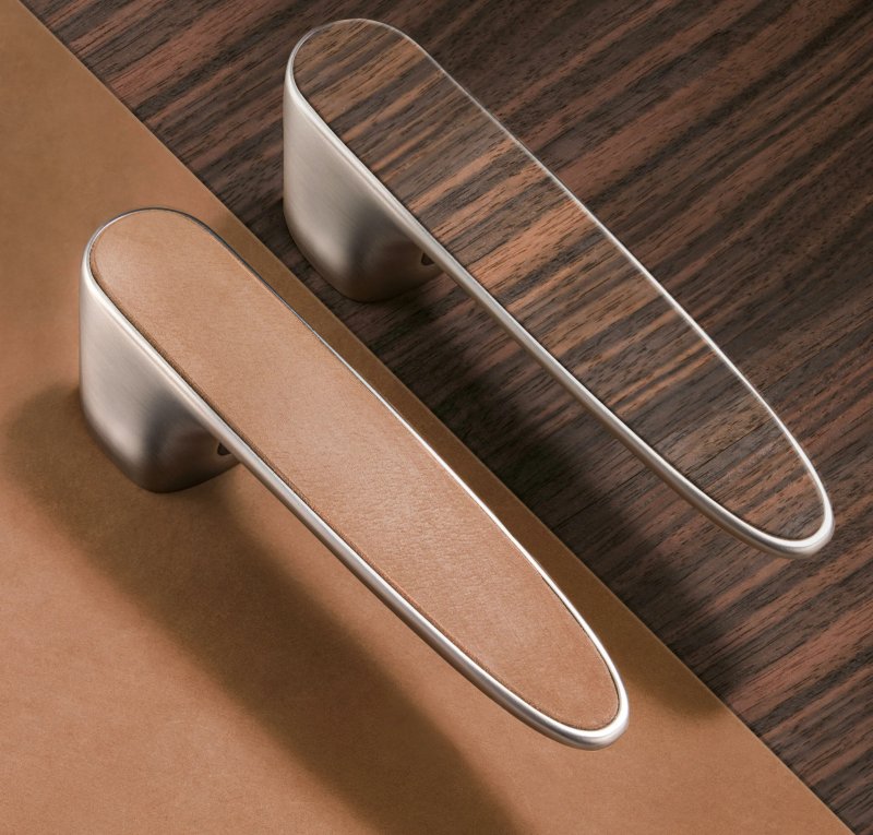 Designer handles for a cabinet