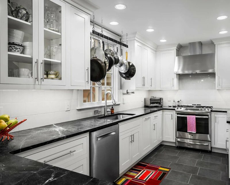 White kitchen with a black countertop