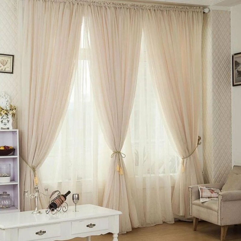 Tulle and curtains in the bedroom