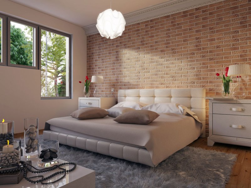 Brick wall in the interior of the bedroom