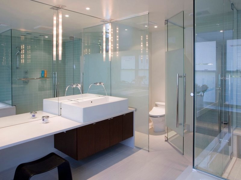 Bath with a glass partition