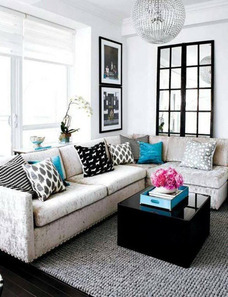 Gray sofa in the interior of the living room