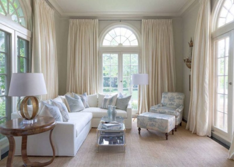 Living room with arched windows