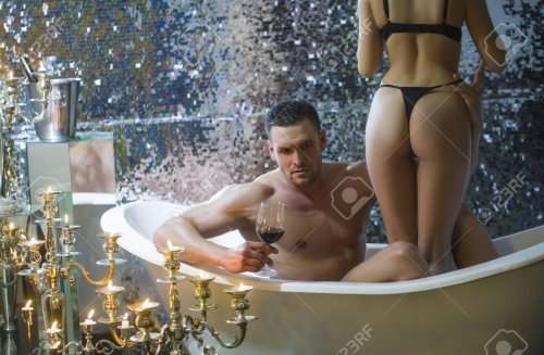 Guy and girl in a bathroom