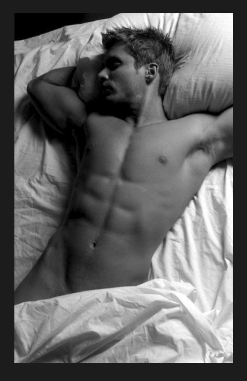 Naked men in bed