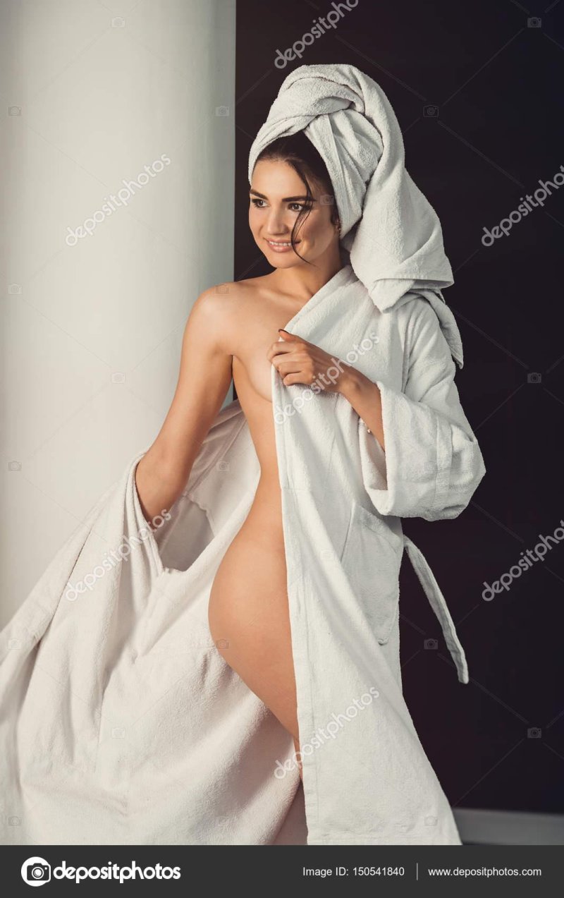 Girl with a towel on the head of nude
