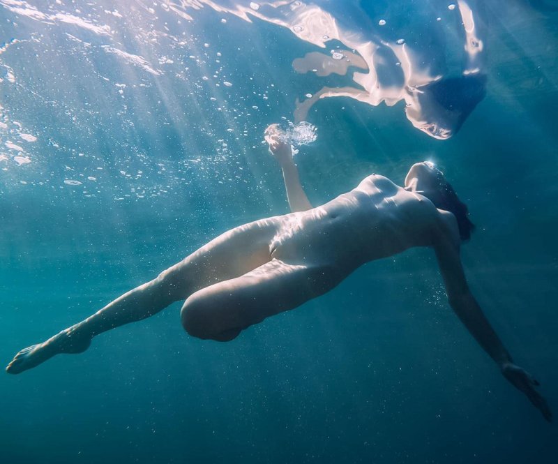 Beautiful naked women underwater