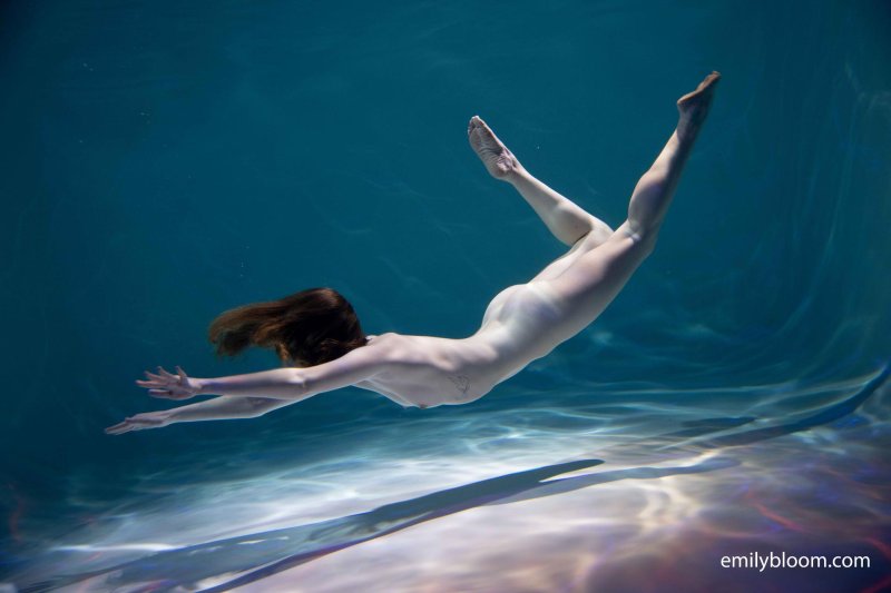 Girl swims under water