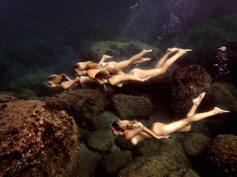 Underwater shooting of naked women