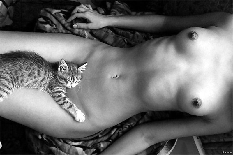 Naked girl with a cat