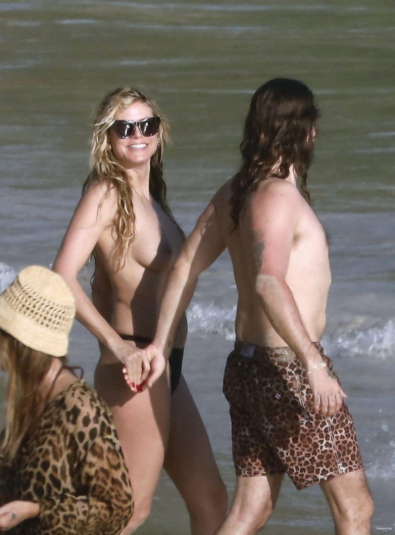 Heidi Klum and Tom Kaulitz on the beach