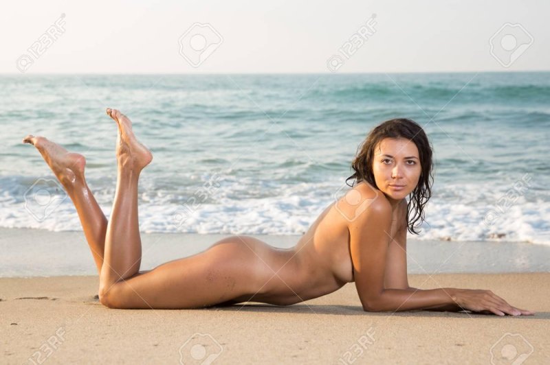 Naked girl on the beach