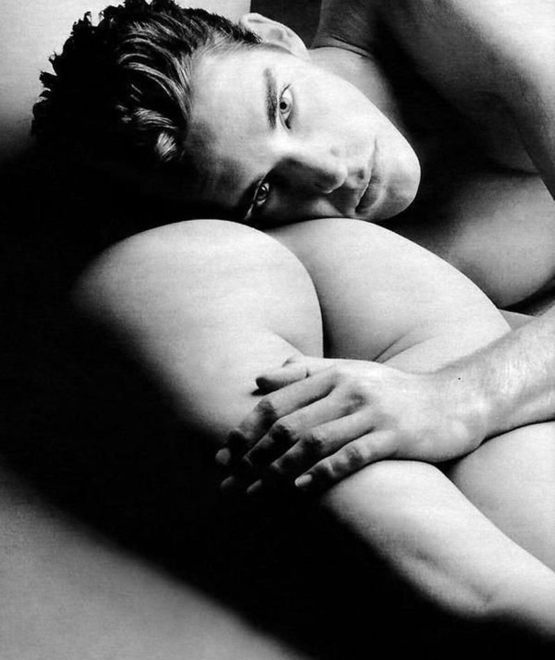 A man lies on girl nude