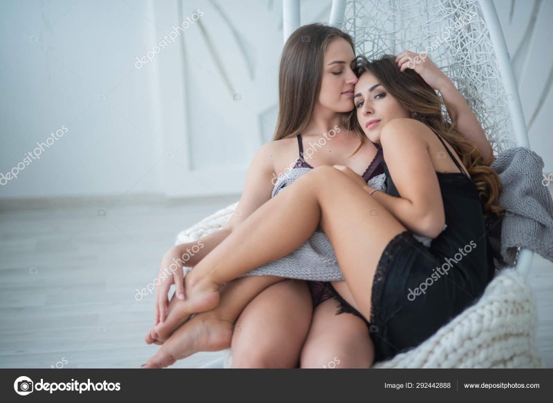 Two girls in underwear hug