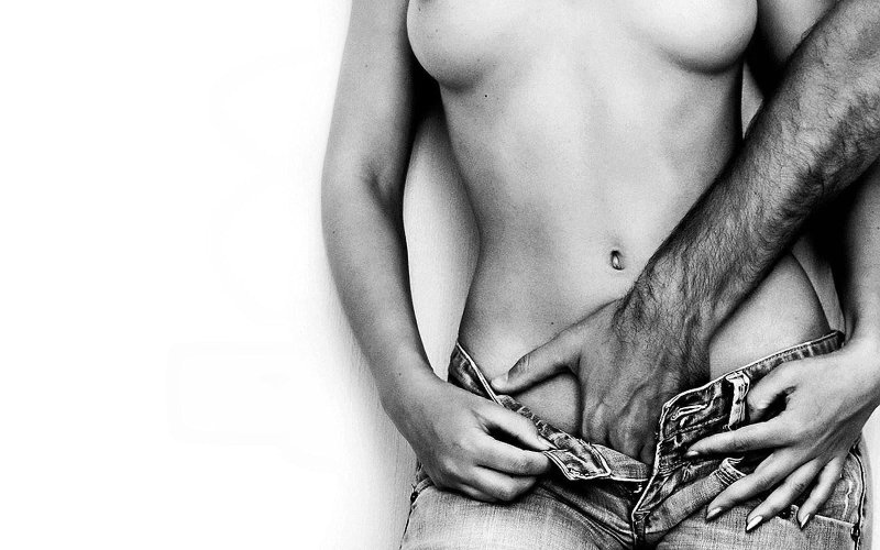 Male hand on female pubis