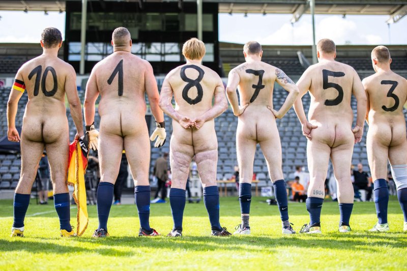 Naked women football players