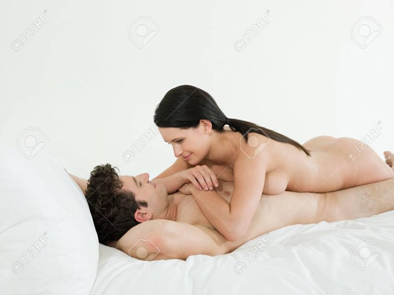 Naked woman lies on a man