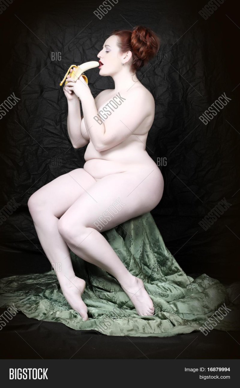 The girl swallows a banana