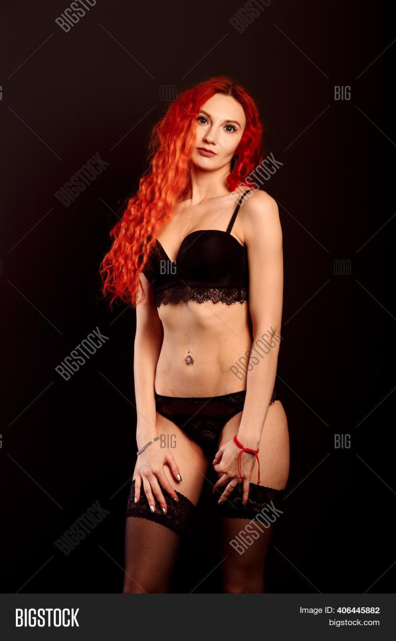 Red -haired girl in underwear