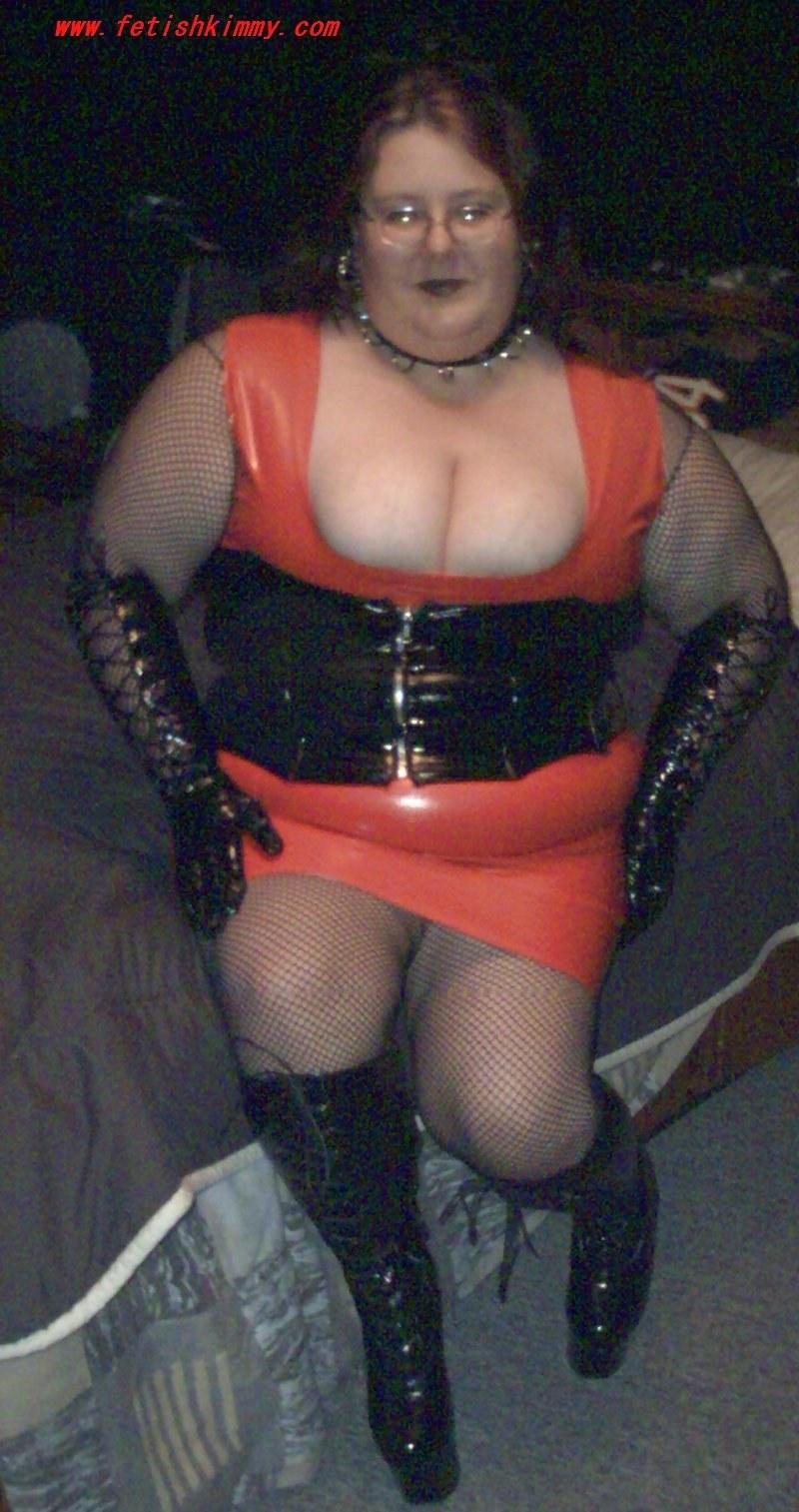 Fat woman in a latex suit