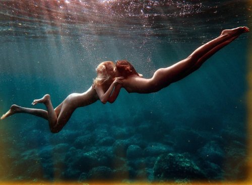 Naked girls in water