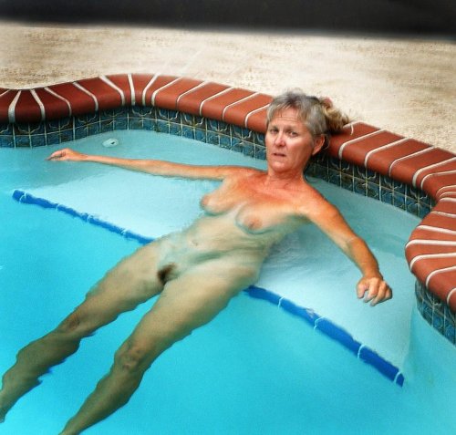 Naked elderly women in the pool