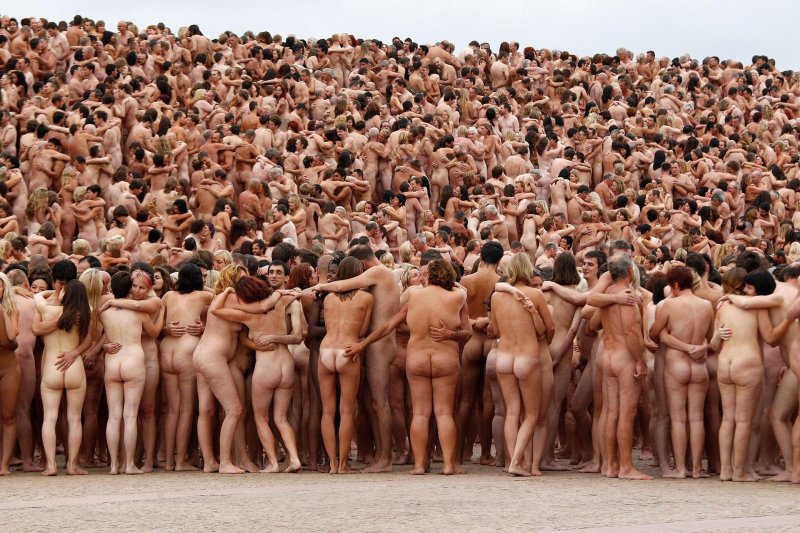 A crowd of naked people