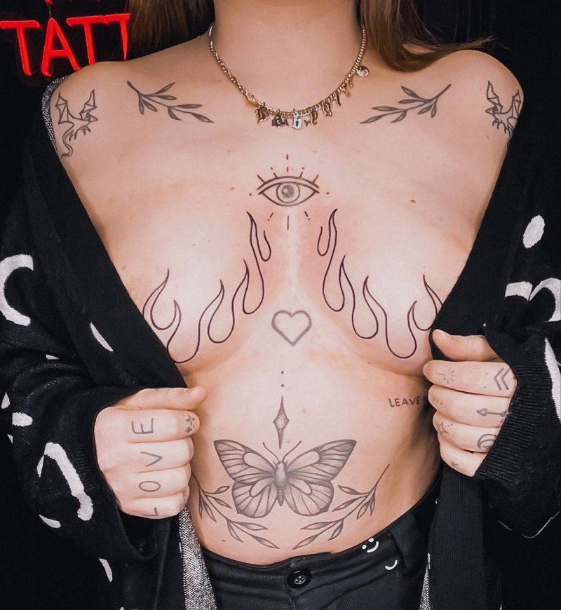 Breast of tattoos
