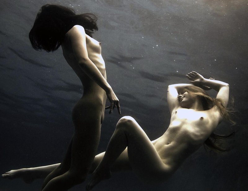 Lesbian girls underwater