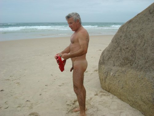Naked elderly men on the beach