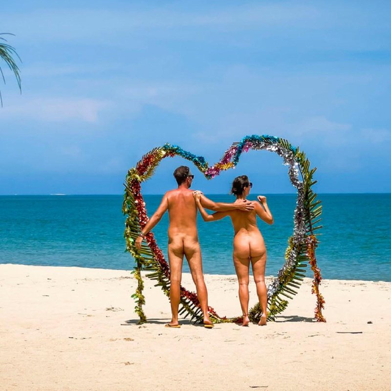 On a nudist beach