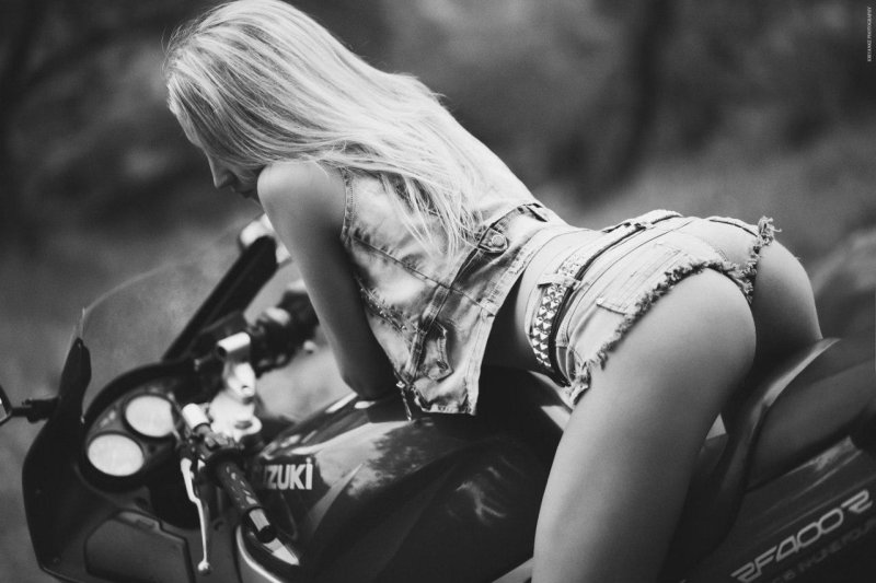 Girl on a motorcycle rear view