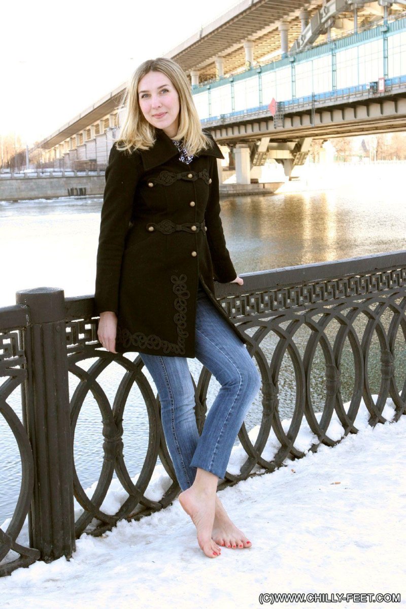 Girl barefoot in the snow