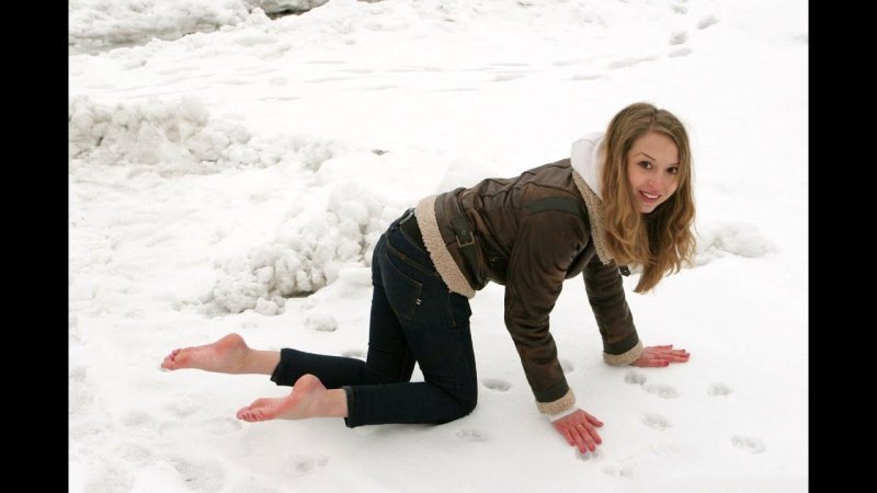 Girl barefoot in the snow