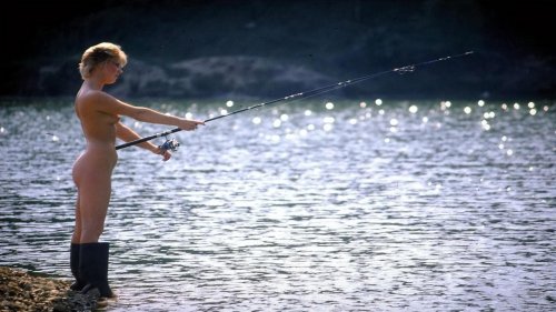 Girls topless fishing