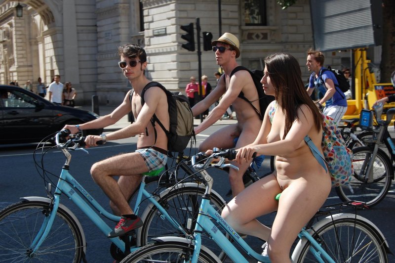 Naked women on a bike racket