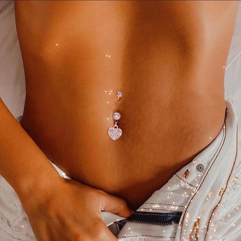 Piercing in the navel heart
